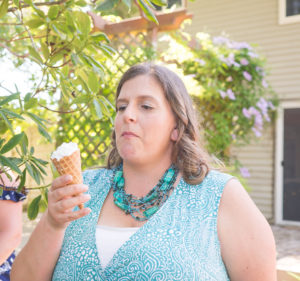 To the family member who worries I am not helping your loved ones "weight problem" [image description: woman standing outside holding an ice cream cone]