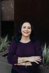 Lauren Muhlheim, Psy.D., CEDS-S, FAED [Image description: photo of middle-aged woman with black hair and arms crossed smiling]